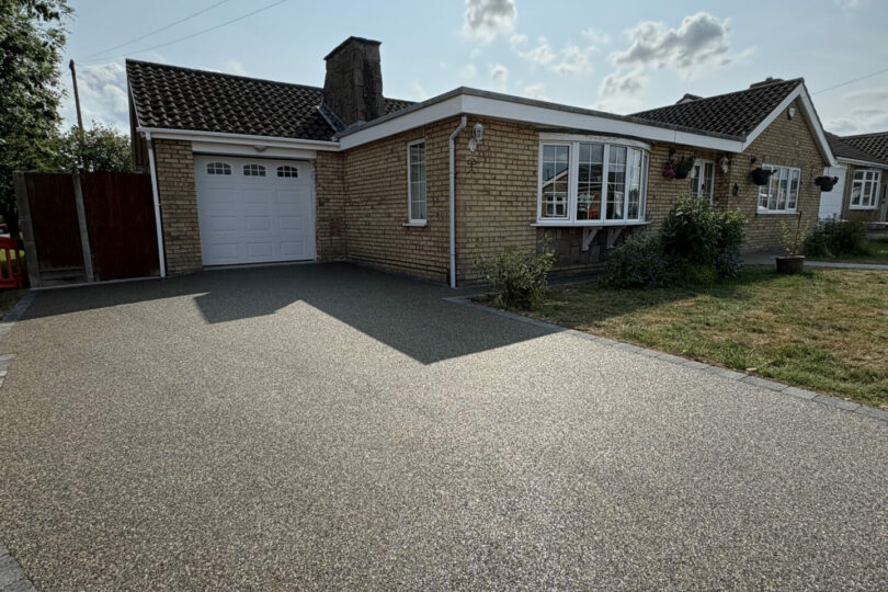 Two Finishes, One Stunning Driveway…